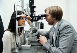 an ophthalmologist doing what they do best